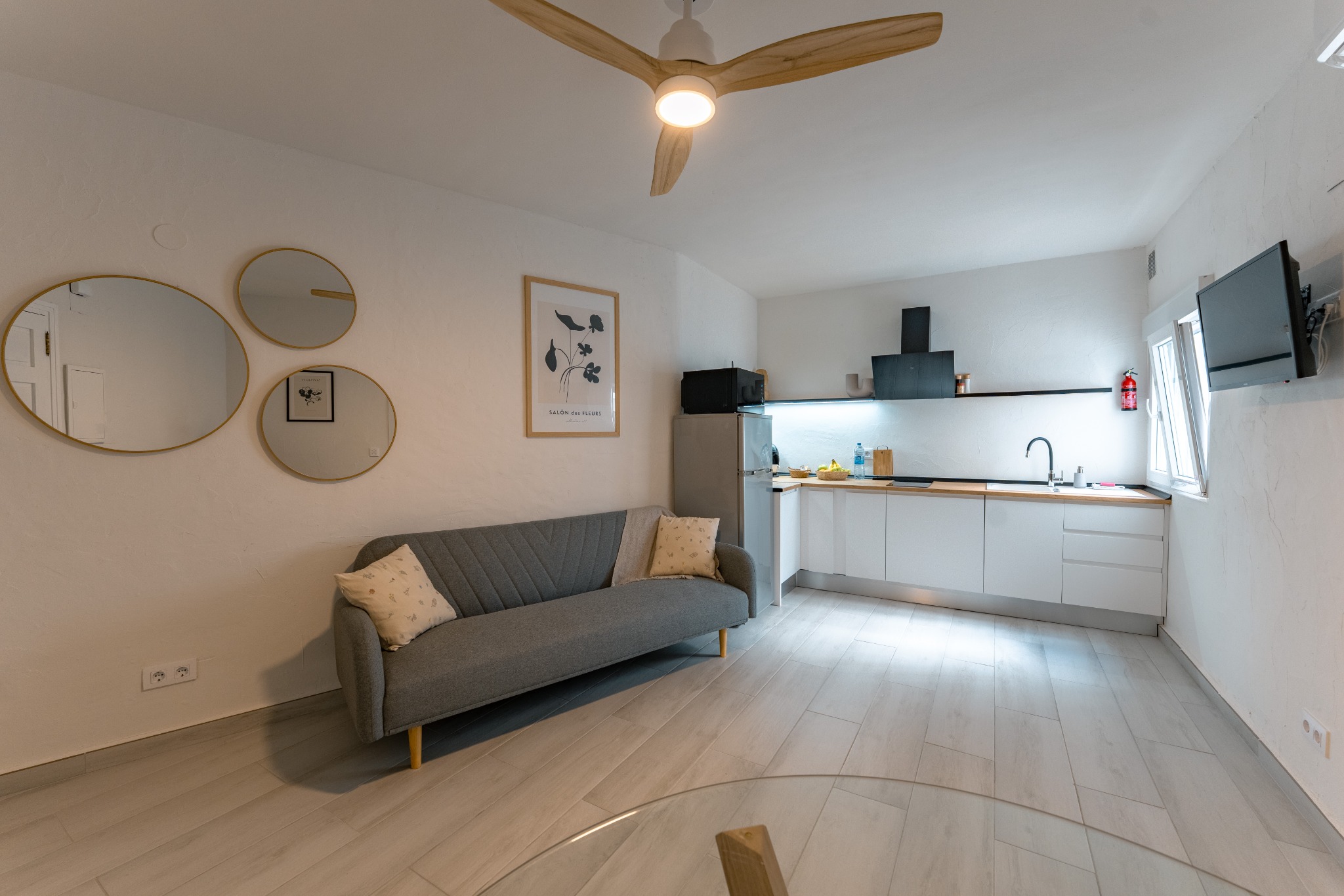Living room and kitchen at Ocean Apartment
